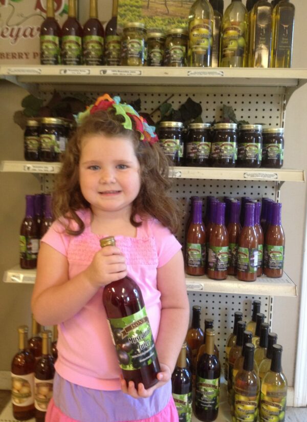 emma_with_isons_muscadine_juice